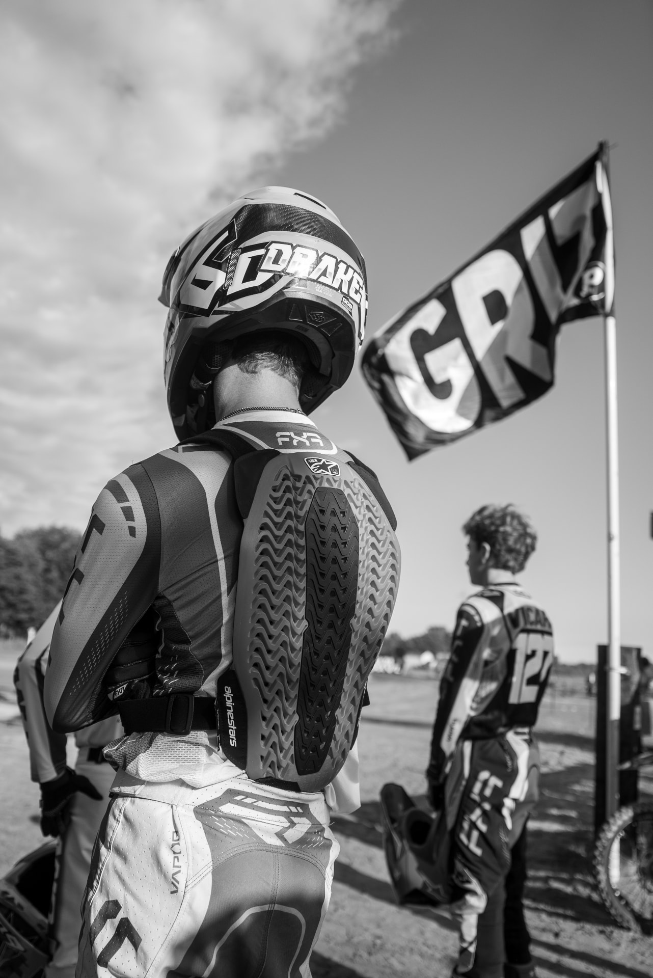 Riders at the starting gate, ready to race.